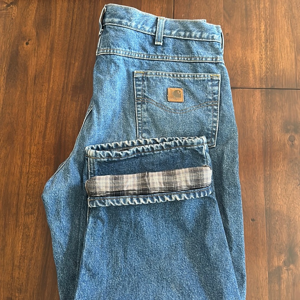 Practically new flannel lined carhartt denim